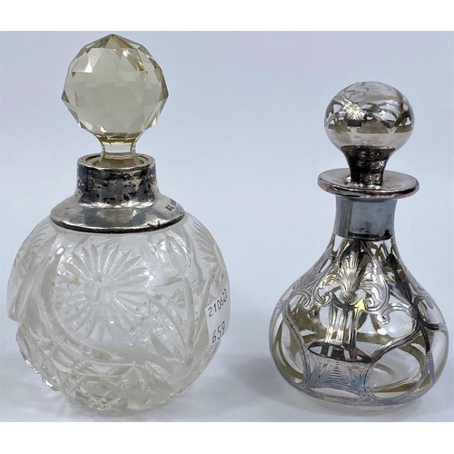 659 - A spherical cut glass scent bottle with silver mount and an overlaid similar 