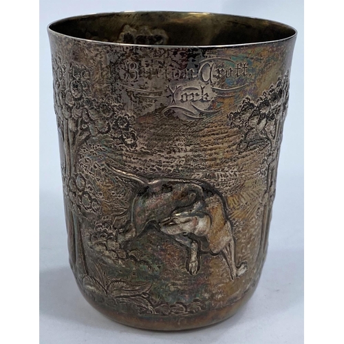 702 - A 19th century silver beaker with embossed decoration, engraved Burton Croft, York, Lucy Dodsworth, ... 