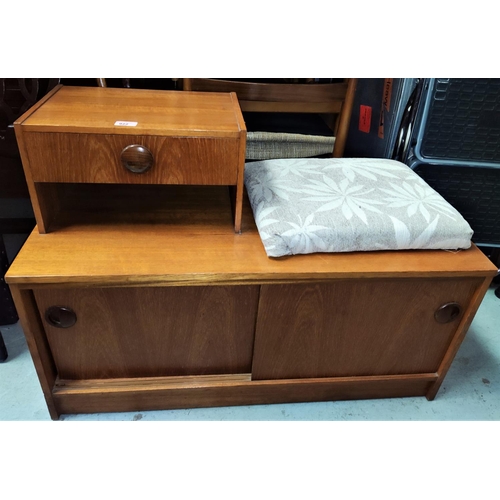 922 - A mid 20th century teak telephone table/hall stand, sliding, enclosed doors and drawer, length 92cm