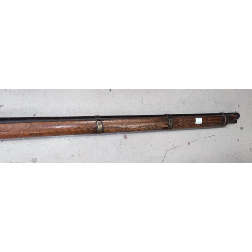 214A - A late 19th century, early 20th century Indian match-lock rifles length 138cm