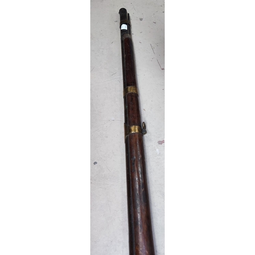 214B - A late 19th century, early 20th century Indian match-lock rifles length 127cm