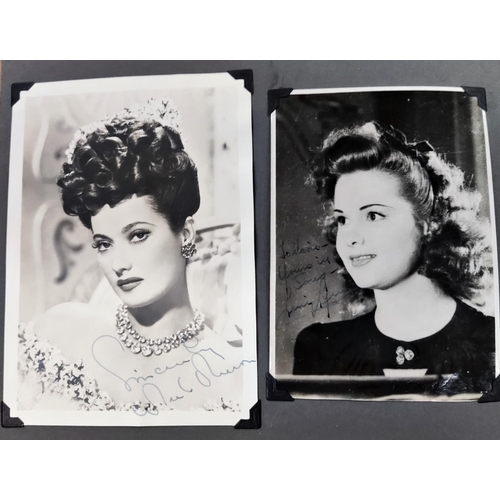 386 - A 1940's and later album of black and white promotional portrait photographs of Hollywood movie star... 