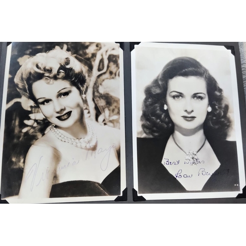 386 - A 1940's and later album of black and white promotional portrait photographs of Hollywood movie star... 