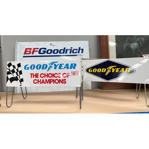45 - Two Goodyear Tires vintage advertising stands and a BF Goodrich Tires advertising sign