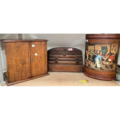 65 - An oak smokers box; an oak letter rack and a litter bin