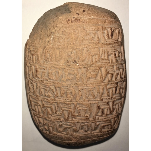 452 - A tablet with cunieform style decoration and a similar pottery bowl