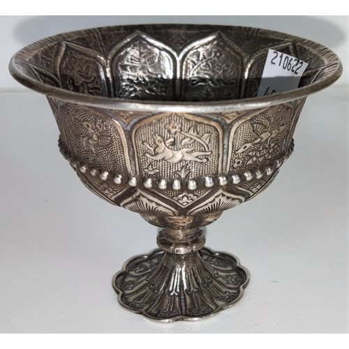 408A - A Chinese white metal small pedestal bowl with relief decorations of animals etc