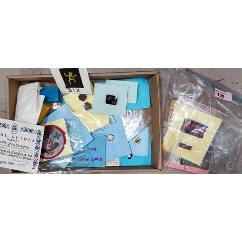 109 - GIRL GUIDES, a collection of enamel badges and other items