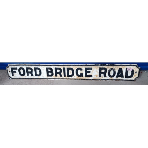 140 - A cast iron road sign, black and white, length 108cm, Ford Bridge Road