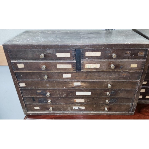 665A - A watch makers cabinet each draw with various watch makers parts etc