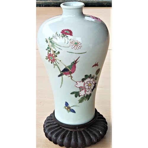 460 - A Chinese ceramic inverted baluster vase with high shoulder and waisted body, decorated with polychr... 