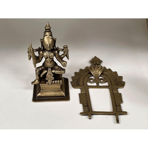 453A - A brass figure of an Indian multi-limbed deity with detachable background, height 17cm and a bronze ... 