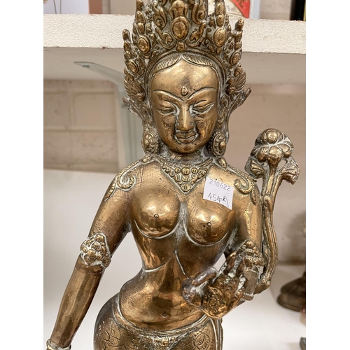 454A - A large gilt Buddhist figure 43cm and a smaller figure