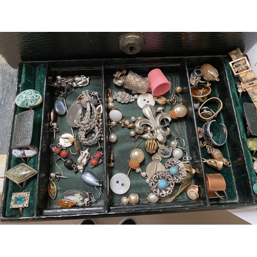 662 - A quantity of costume jewellery in a Victorian Finnegans jewellery box
