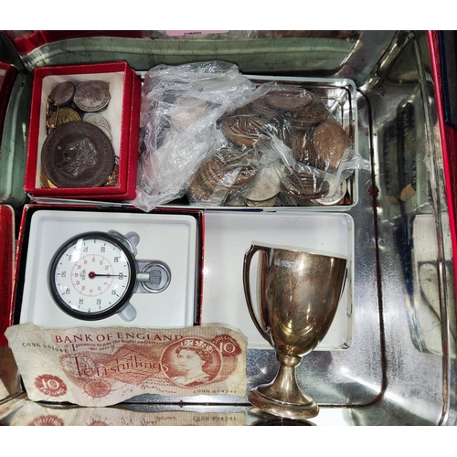 147 - A HEVER sports stopwatch, a small silver trophy cup and a quantity of coins; a Manchester 1887 Exhib... 