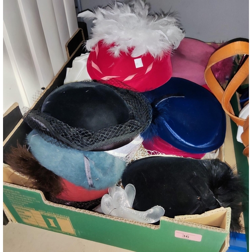 36 - A large selection of 1980's hats decorated with feathers; etc.