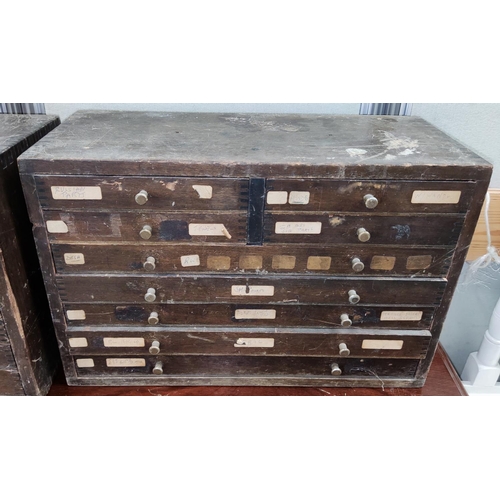 665B - A watch makers cabinet each draw with watch makers parts etc