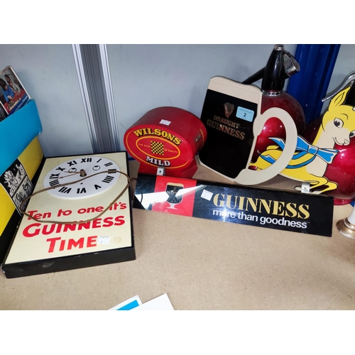 2 - A selection of Guinness and other pub signage; a Robinson's jug, others similar