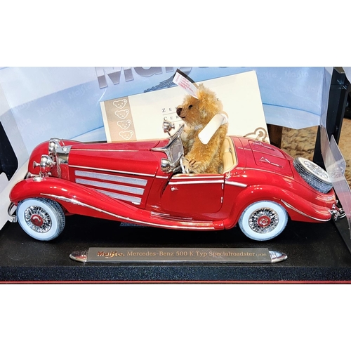 297 - A Steiff Maisto Merc 550K with mini-bear and certificate; a Mercedes E-Class model, boxed