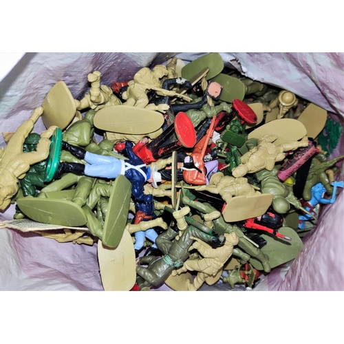 308 - A vintage toy castle with large selection of vintage plastic soldiers