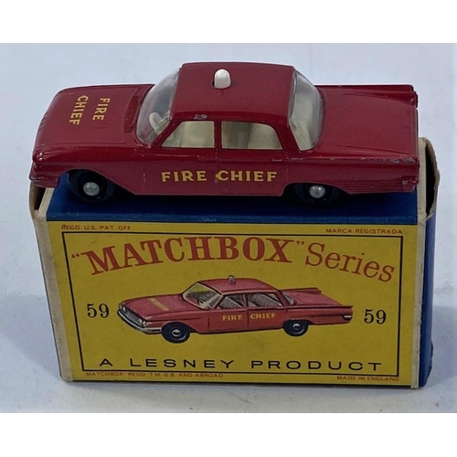 319 - A vintage boxed Matchbox Fire Chief White light