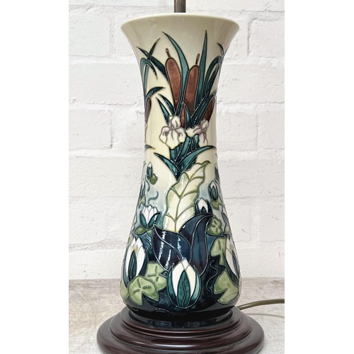 436 - A modern Moorcroft table lamp of tapering waisted form, 'Lamia' pattern decorated with waterlilies a... 