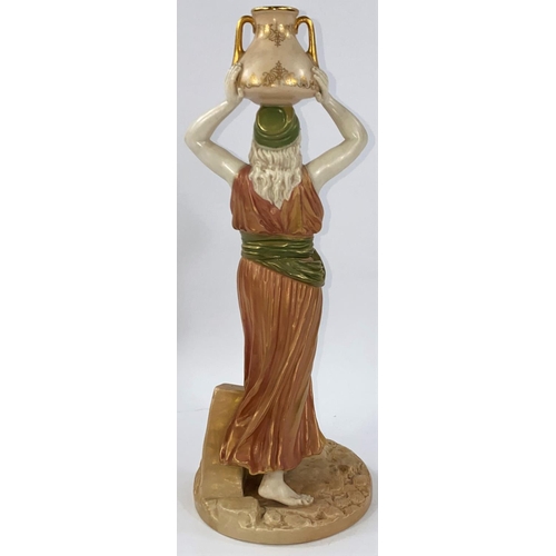 538 - A late 19th/early 20th century Royal Worcester figure of a female water carrier, her arms holding a ... 