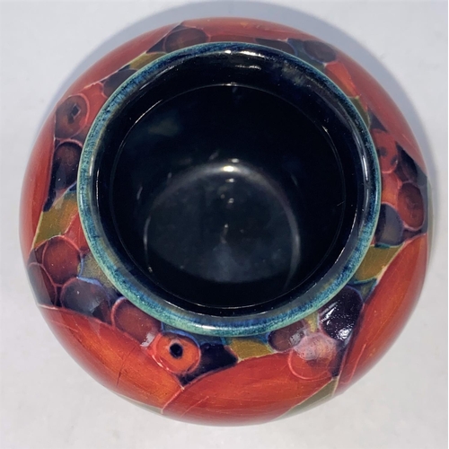 542 - A Moorcroft squat vase, signed to base, height 6 cm