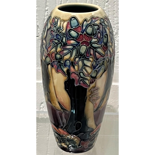 576 - A modern Moorcroft elongated ovoid vase 'Knightswood', decorated with stylised trees, impressed and ... 