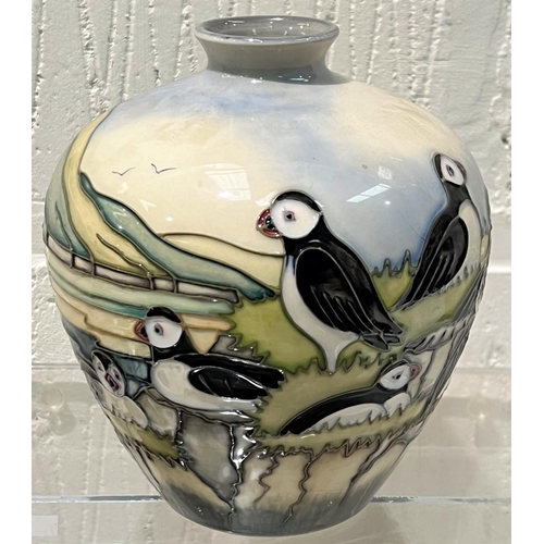 577 - A modern Moorcroft squat tapering vase decorated with puffins, impressed, monogrammed, 97, height 19... 