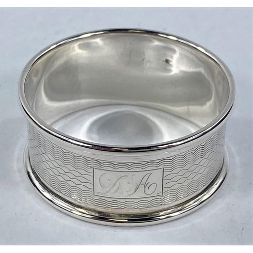 696 - A silver engraved  and pierced napkin ring, Birmingham 1913; 5 other hallmarked rings, 3.4 oz