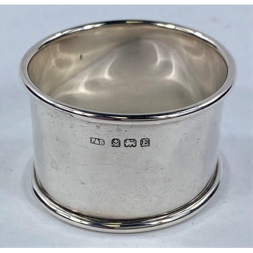 696 - A silver engraved  and pierced napkin ring, Birmingham 1913; 5 other hallmarked rings, 3.4 oz