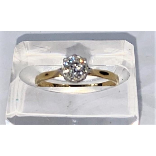 707 - A yellow metal ring with diamond in illusion setting, stamped '18 ct' & 'Plat', 0.5 carat