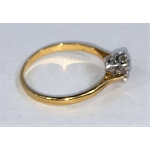 707 - A yellow metal ring with diamond in illusion setting, stamped '18 ct' & 'Plat', 0.5 carat