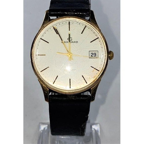 708 - A gents Garrard digital wristwatch, 9 ct gold hallmark to back