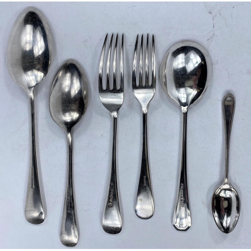 740 - Three hallmarked silver teaspoons and a selection of Mappin & Webb and other cutlery