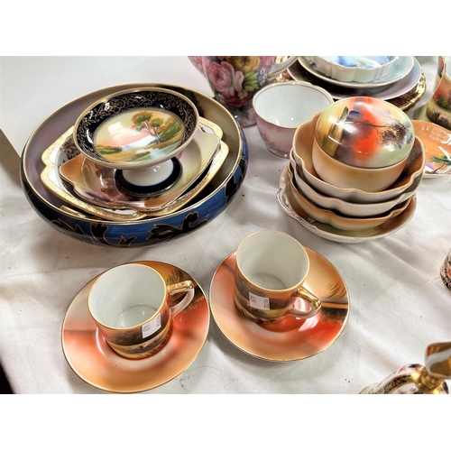 409 - A selection of Noritake and similar china coffee ware; plates; etc., hand painted with landscapes