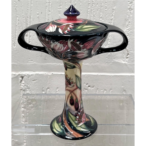 424 - A modern Moorcroft 2-handled covered vase on tall slender pedestal 'Symphony' pattern decorated with... 