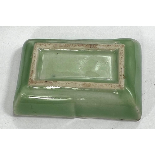 489 - A Chinese carved hardstone bowl dia. 13cm and a Celadon coloured bowl on wooden stand