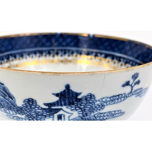 493 - An 18th century Chinese gilt highlighted blue and white bowl, 14.5cm