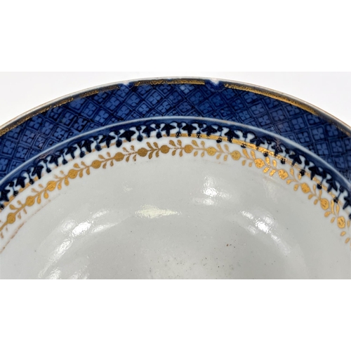 493 - An 18th century Chinese gilt highlighted blue and white bowl, 14.5cm