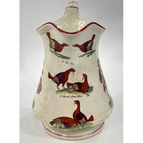 511 - A 19th century puzzle jug by Elsmore & Forster, decorated with fighting cocks and comedy figures... 