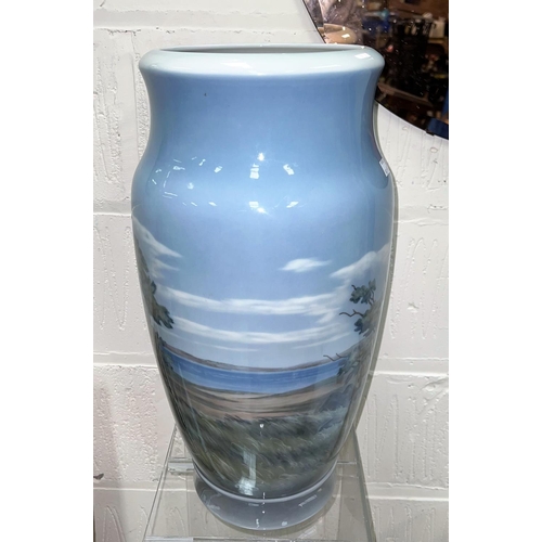 541A - A very large Royal Copenhagen baluster vase decorated with a river landscape, printed mark monogramm... 