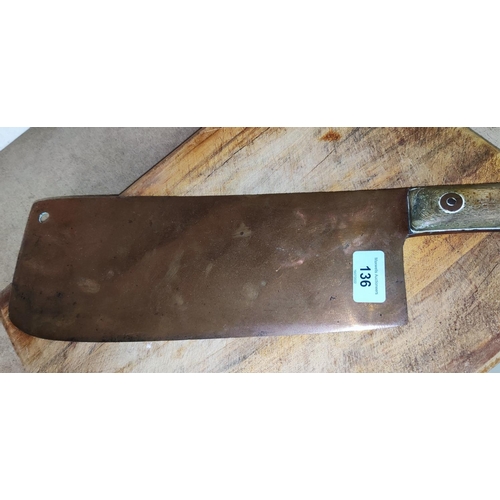 136 - A large 19th century copper bladed (possibly Naval) cleaver with wooden handles length 53cm and a Bu... 