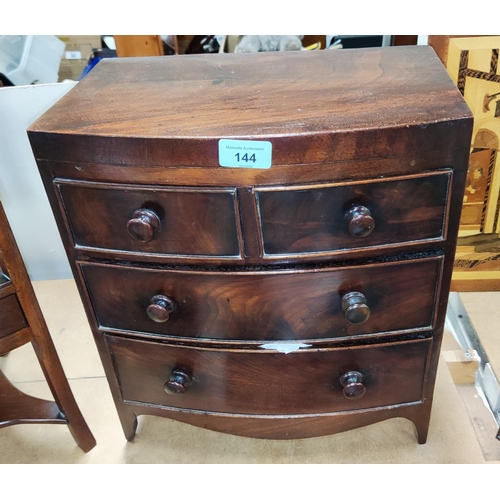 144 - A 19th century mahogany apprentice chest of 2 long and 2 short drawers with bow front, bobbin handle... 