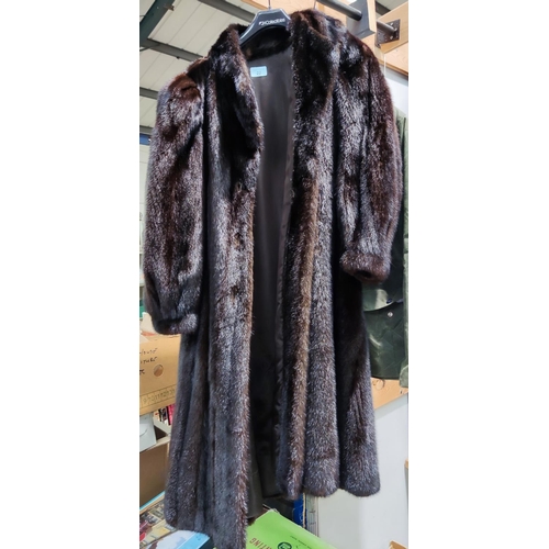 22 - A ladies full length mink coat, size 10/12
