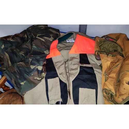 38 - A Columbia Sportswear XXL hunting vest and 3 similar hunting vests