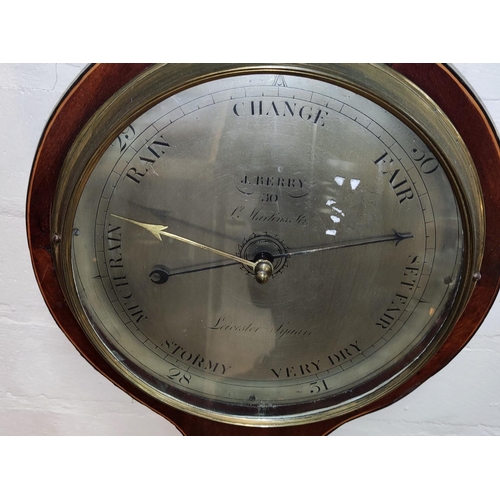 55B - An inlaid banjo shaped barometer with brass dial by J. Berry Leister