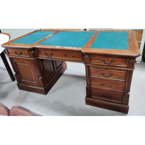 988 - A period style mahogany partners desk with inset leather top, 6 frieze drawers, twin pedestals with ... 