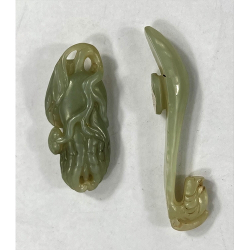 478 - A Chinese carved hard stone belt hook and another naturalistic hard stone carving, 9cm and 6cm